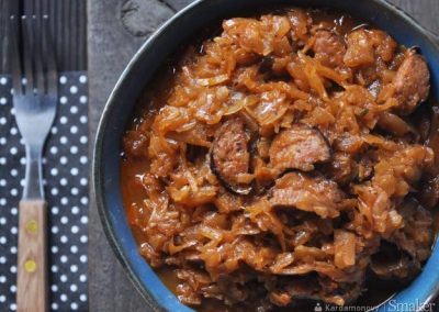 Plate of traditional polish bigos - cabbage cooked with sausage